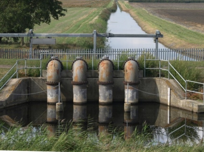 the 1997 discharge pipes and view along the Straight Drain